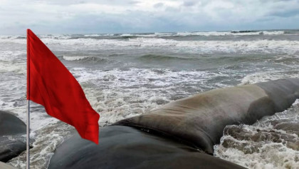 Low pressure builds over the sea, with danger signal 3 at two ports