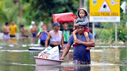 Philippines evacuates one million, woman dead as super typhoon nears