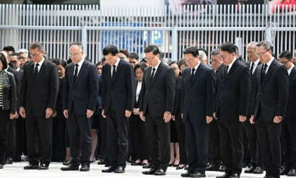 Hong Kong mourns 128 fire victims