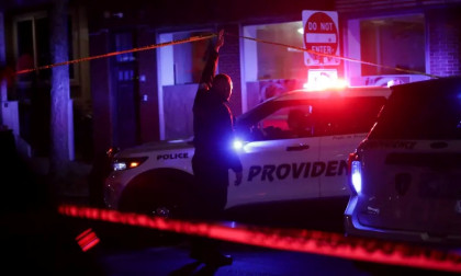 Police hunt gunman who killed two at US university