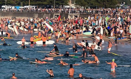 Hundreds swim and float at Bondi Beach to commemorate shooting victims
