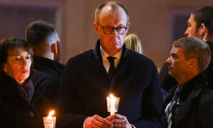Germany’s Merz urges ‘peaceful coexistence’ a year after deadly market attack