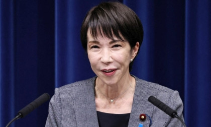 Japan govt approves record budget, including for defence