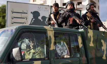 Syria imposes a curfew on the port city and detains 21 people connected to Assad's rule