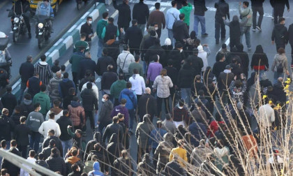 Iran security forces member stabbed, shot dead at protest: agency