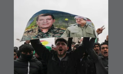 Syria strikes Kurdish area of Aleppo as fighters refuse to evacuate