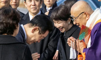 Japan, South Korea leaders drum up viral moment with K-pop jam