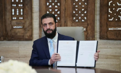 Syria’s leader agrees truce with Kurds after govt troops advance