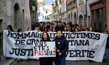 Protesters demand 'justice' one month after Swiss bar fire