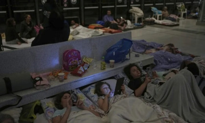 Israelis take cover after Iran fires missiles