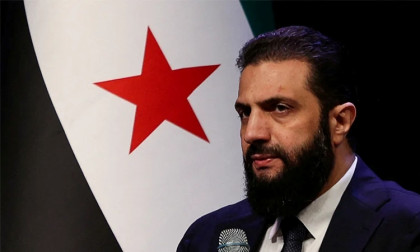 Syria reports Hezbollah shelling across the border