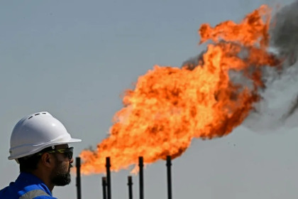 Oil prices drop after hitting four-year high as US stocks reach records