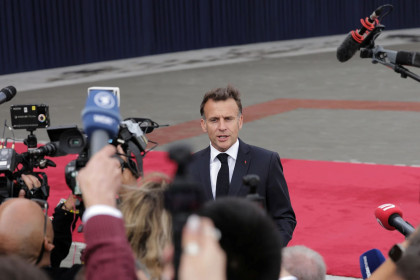 Macron urges US and Iran to coordinate over Strait of Hormuz reopening