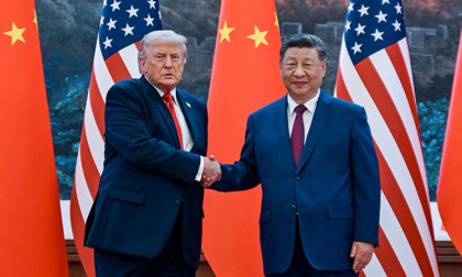 Xi welcomes Trump for superpower summit in Beijing