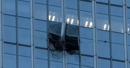 Plane crashes into Beijing high-rise building, kills pilot, injures 13