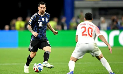 Messi's free-kick advances Argentina to next round