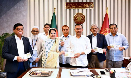 PM unveils stamp marking National Rural Development Day