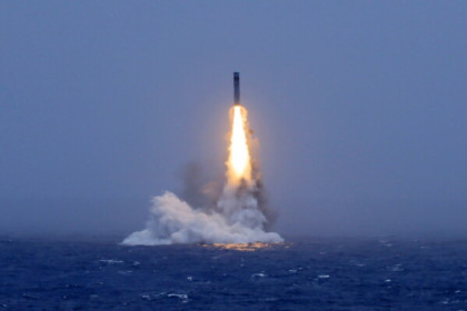 China conducts rare submarine missile test in clear signal to Washington