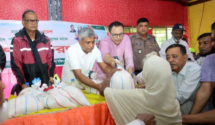 Amit provides relief assistance to flood victims in Ctg