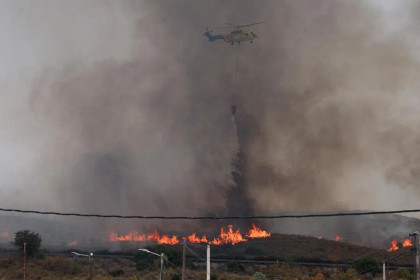 Spain wildfire kills 13, including 12 foreign nationals